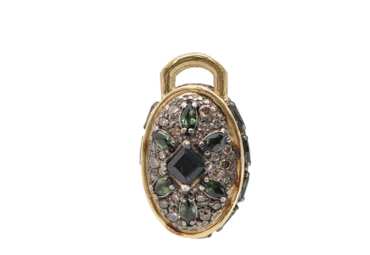 18kt yellow gold and blackened sterling silver small oval shield charm with 3mm square blue sapphire, champagne pave diamonds, marquise blue/green tourmaline. Charm Size 0