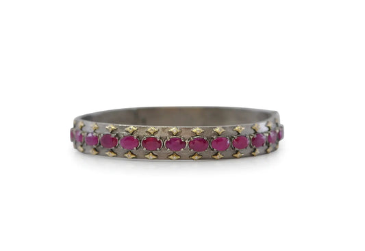 18k yellow gold and grey sterling silver kick huggie with crivelli, white diamonds and oval rubies. BRACELET Size 7.5