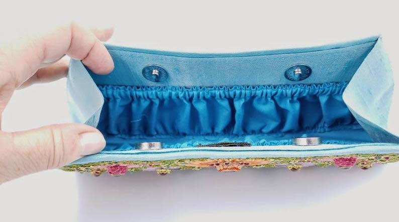 Star Ruby Gemstone + Silk Hand Embroidered Clutch | Turquoise Silk with Multicolor Embroidered Ruby Florals