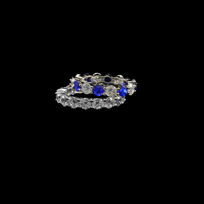 Diamondique Round Eternity Travel Wedding Band Ring | S7 Silver