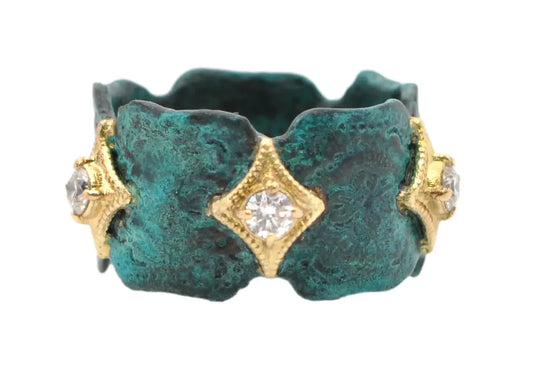 18k yellow gold artifact stack ring in teal patina with crivellis and white diamonds. RING Size 7