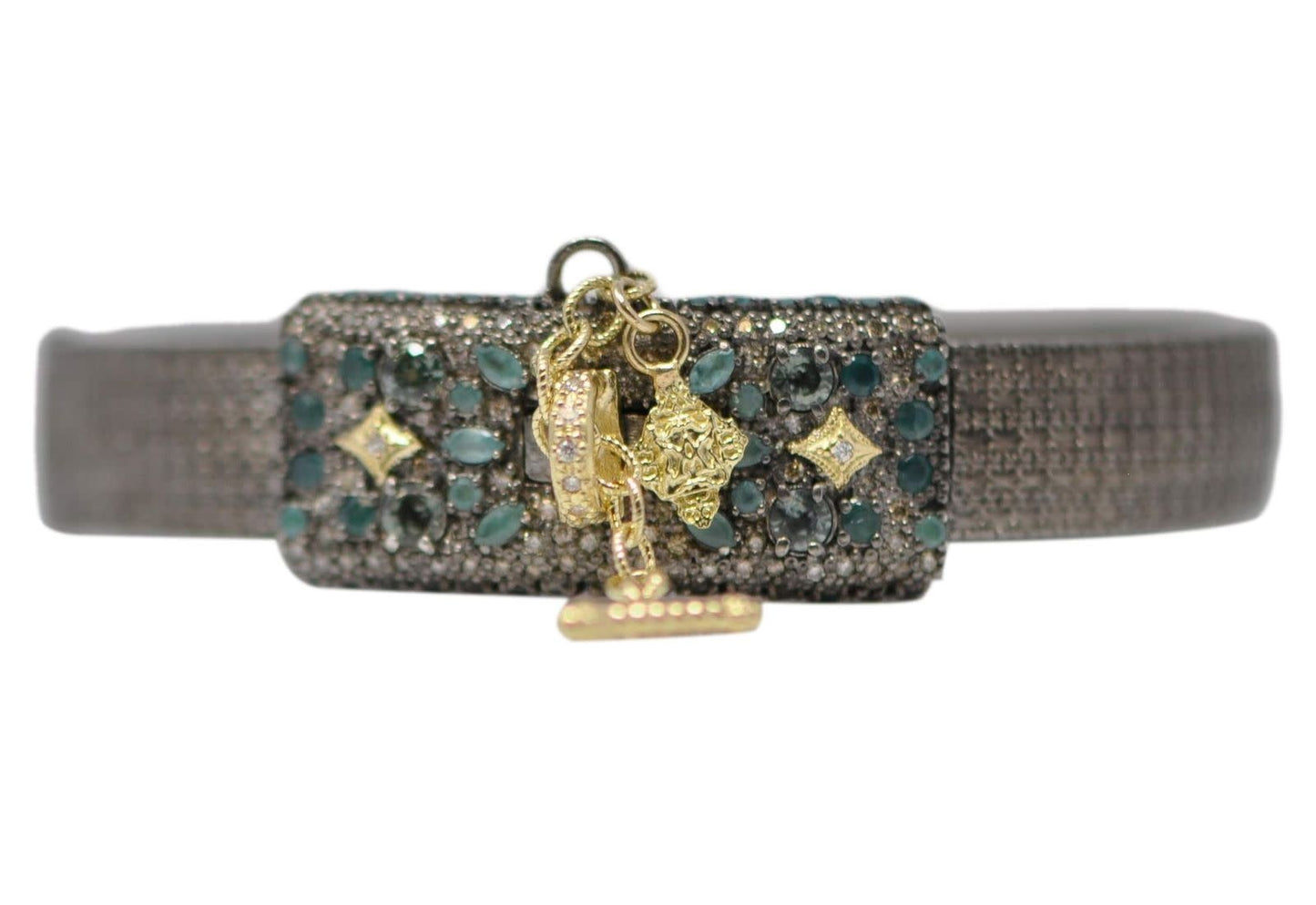 18k yellow gold and grey sterling silver textured huggie with pave double lock closure and safety chain with blue sapphires, grandidierite, white and champagne diamonds. Bracelet Size 0