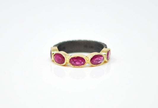 18K Yellow Gold and Grey Sterling silver ring with oval rubies on contoured shank. RING Size 7