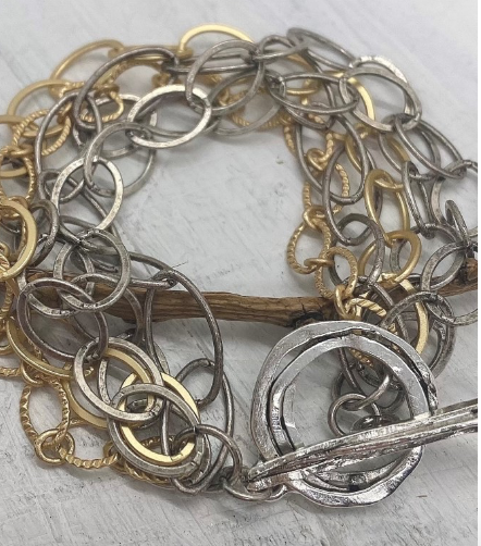 Kitzi Gold and Silver Multi Chain  with Silver Toggle Bracelet